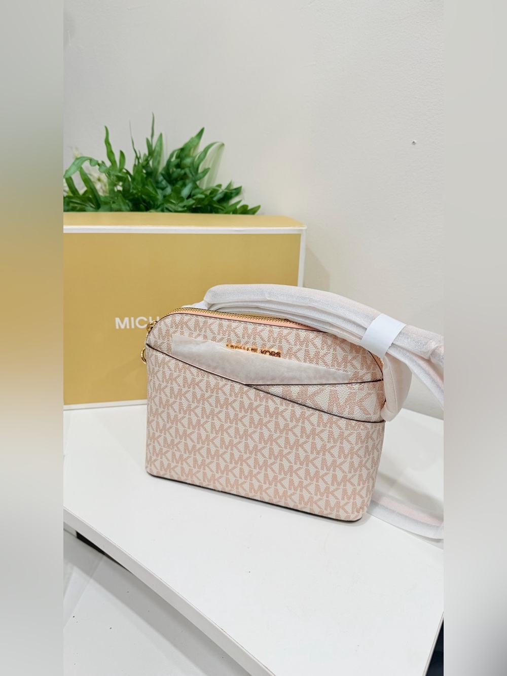 Michael Kors Jet Set Travel Medium Logo Dome Crossbody Bag in the powder blush